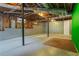 Unfinished basement with exposed ceiling, support beams, and concrete flooring at 5923 Rosie Se Ln, Mableton, GA 30126
