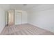 Carpeted bedroom includes a closet and access to other areas of the home at 5923 Rosie Se Ln, Mableton, GA 30126