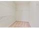 Walk-in closet with carpeted floor and wire shelving at 5923 Rosie Se Ln, Mableton, GA 30126