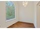 Dining area with large window and chandelier, ready for new furniture at 5923 Rosie Se Ln, Mableton, GA 30126