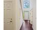 Bright entryway with hardwood floors and large window letting in natural light at 5923 Rosie Se Ln, Mableton, GA 30126