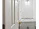 Clean half bathroom features a white marble countertop and white vanity at 5923 Rosie Se Ln, Mableton, GA 30126