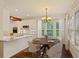 Updated eat in kitchen features stainless steel appliances, marble counter tops and large windows at 5923 Rosie Se Ln, Mableton, GA 30126
