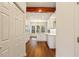 Bright, updated kitchen, white cabinets, marble counters and hard wood floors at 5923 Rosie Se Ln, Mableton, GA 30126