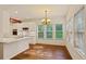 Updated eat in kitchen features stainless steel appliances, marble counter tops and hard wood floors at 5923 Rosie Se Ln, Mableton, GA 30126
