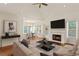 Open living space features a fireplace, ample seating, and dining room at 5923 Rosie Se Ln, Mableton, GA 30126