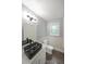 Stylish bathroom featuring a modern vanity with marble countertop and accent faucet at 7156 Whitfield Drive Dr, Riverdale, GA 30296