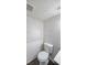 Powder room featuring modern fixtures and decorative paneling at 7156 Whitfield Drive Dr, Riverdale, GA 30296