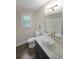 Modern bathroom with granite countertop, accent lighting, and a bowl sink at 7156 Whitfield Drive Dr, Riverdale, GA 30296