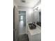 Bathroom featuring a modern vanity with marble countertop and accent faucet at 7156 Whitfield Drive Dr, Riverdale, GA 30296