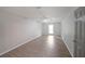 Bright bedroom with new flooring, ceiling fan, and natural light at 7156 Whitfield Drive Dr, Riverdale, GA 30296