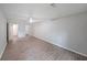 Spacious bedroom featuring modern flooring and neutral wall paint at 7156 Whitfield Drive Dr, Riverdale, GA 30296