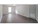 Spacious bedroom with ample natural light and hardwood floors throughout at 7156 Whitfield Drive Dr, Riverdale, GA 30296