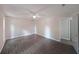 Spacious bedroom featuring modern flooring and a ceiling fan at 7156 Whitfield Drive Dr, Riverdale, GA 30296