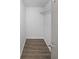 Walk-in closet featuring modern flooring and shelving system at 7156 Whitfield Drive Dr, Riverdale, GA 30296