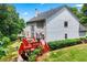 Well-manicured backyard with a spacious deck and lush landscaping for outdoor enjoyment at 1115 Ballington Dr, Cumming, GA 30041
