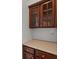 Close up of Butlers Pantry featuring custom stained wood cabinets and countertops at 1115 Ballington Dr, Cumming, GA 30041