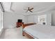 Spacious main bedroom with tray ceiling, ceiling fan, and carpet at 1115 Ballington Dr, Cumming, GA 30041