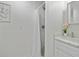 Bathroom featuring a modern vanity with marble countertop and glass-enclosed shower at 2485 Hillside Ave, Decatur, GA 30032