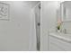 Modern bathroom with white marble countertop, decorative sink and walk-in shower at 2485 Hillside Ave, Decatur, GA 30032