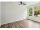 Bright bedroom with large windows offering natural light and serene outdoor views at 2485 Hillside Ave, Decatur, GA 30032