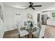 Modern dining area with a glass table, seating for four, and contemporary decor at 2485 Hillside Ave, Decatur, GA 30032
