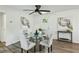 Elegant dining area with glass table, gray chairs, and stylish decor for entertaining guests at 2485 Hillside Ave, Decatur, GA 30032