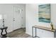 Bright foyer with hard surface floors, white walls, console table, and modern lamp at 2485 Hillside Ave, Decatur, GA 30032