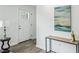 Bright entryway featuring modern console table, stylish lamp, and contemporary art at 2485 Hillside Ave, Decatur, GA 30032