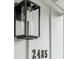 Close up of the number 2485 next to a porch light at the front of a home at 2485 Hillside Ave, Decatur, GA 30032