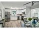 Modern kitchen with stainless steel appliances, white cabinets, and marble countertops at 2485 Hillside Ave, Decatur, GA 30032