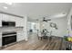 Open-concept living space with modern kitchen, dining area, and stylish furniture at 2485 Hillside Ave, Decatur, GA 30032