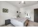 Bedroom with neutral carpet, a bed, a vanity, and lots of natural light at 2525 Well Springs Dr, Buford, GA 30519