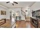 Inviting living room showcasing hardwood floors, staircase, and ample natural light at 2525 Well Springs Dr, Buford, GA 30519