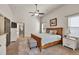 Bright main bedroom with vaulted ceiling, neutral colors, carpet, and an ensuite bathroom with a glass-enclosed shower at 2525 Well Springs Dr, Buford, GA 30519
