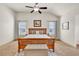 Spacious main bedroom features a vaulted ceiling, neutral color palette, and an abundance of natural light at 2525 Well Springs Dr, Buford, GA 30519