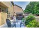 Backyard patio with a hot tub under a pergola, seating area, and landscaping, perfect for outdoor living at 2525 Well Springs Dr, Buford, GA 30519