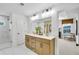 Bright bathroom with a double vanity, walk-in shower, and stylish decor, providing a functional and attractive space at 5769 Tillman Way, Powder Springs, GA 30127