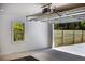 Spacious garage interior featuring an open door and view of the backyard at 888 Tucker Rd, Stone Mountain, GA 30087