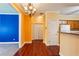 View from the kitchen through the house, showing colorful walls, and ample living space at 99 Rainwater Ln, Dallas, GA 30157