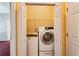 Convenient laundry closet featuring modern washer and dryer, and ample storage space at 99 Rainwater Ln, Dallas, GA 30157