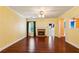 Spacious living room with hardwood floors, fireplace, ceiling fan and natural light at 99 Rainwater Ln, Dallas, GA 30157