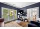 Bright home office featuring a large window, French doors, and flexible workspace at 1205 Compass Pointe Xing, Alpharetta, GA 30005