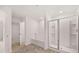 Bright bathroom featuring a shower, a soaking tub, and a walk-in closet at 1309 Aura Ln, Lawrenceville, GA 30045