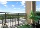 Outdoor balcony showcasing beautiful neighborhood views, artificial turf, and decorative lanterns at 711 Cosmopolitan Ne Dr # 625, Atlanta, GA 30324