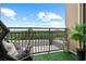 Relax on this balcony with a scenic view and comfortable seating, perfect for enjoying the outdoors at 711 Cosmopolitan Ne Dr # 625, Atlanta, GA 30324