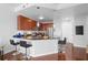 Eat-in kitchen featuring a breakfast bar, sleek counter tops and modern stainless steel appliances at 711 Cosmopolitan Ne Dr # 625, Atlanta, GA 30324