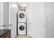 Efficient laundry closet with stacked washer and dryer for convenient in-home laundry at 711 Cosmopolitan Ne Dr # 625, Atlanta, GA 30324