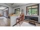 Bright kitchen features a breakfast bar with seating, creating a cozy and functional space at 962 Brighton Dr, Lawrenceville, GA 30043