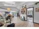 Bright and airy living room with stone fireplace, skylights, and tile floors perfect for entertaining at 962 Brighton Dr, Lawrenceville, GA 30043